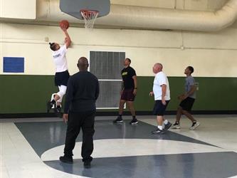 A student goes up for the dunk!