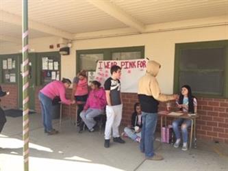 Students getting ready for Breast Cancer Day.